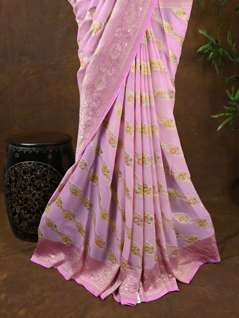 Pure georgette fancy saree light pink color allover zari motifs & zari border with rich pallu and plain blouse