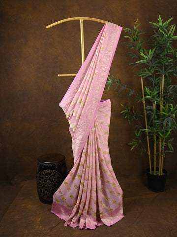 Pure georgette fancy saree baby pink color allover zari motifs & zari border with rich pallu and plain blouse