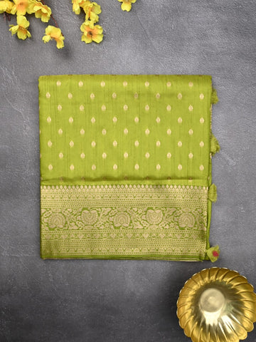 Dupion fancy saree parrot green color allover zari motifs & zari border with rich pallu and plain blouse