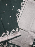Raw silk fancy saree dark green color allover zari motifs & zari border with zari pallu and plain blouse