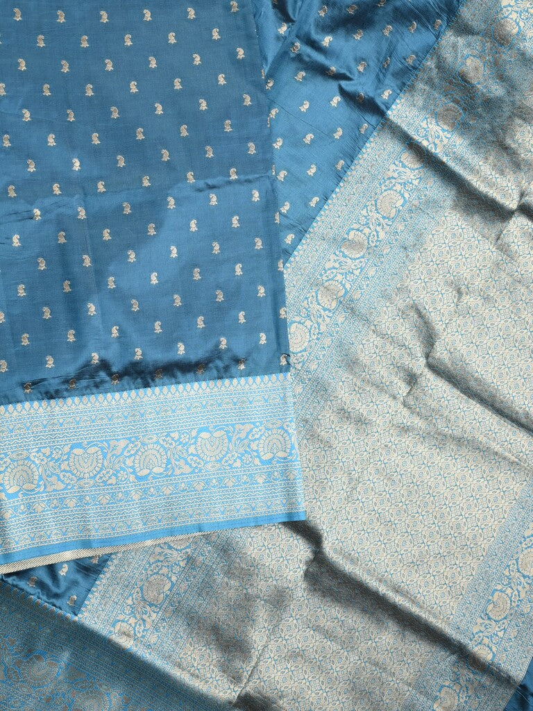 Dupion fancy saree peacock blue color allover zari motifs & zari border with rich pallu and plain blouse