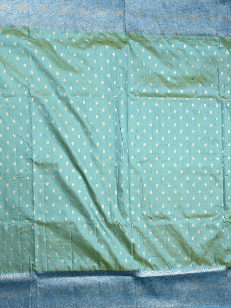 Dupion fancy saree sky blue color allover zari motifs & zari border with rich pallu and plain blouse