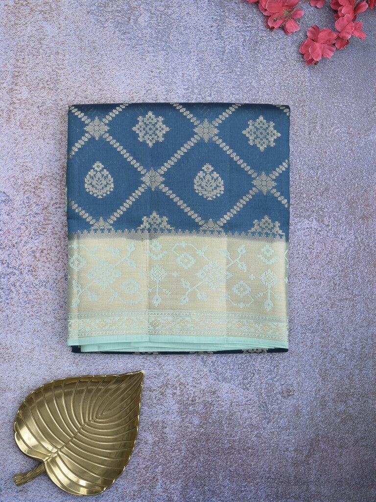 Raw mango pattu saree peacock blue color allover zari weaves & zari border with rich pallu and contrast plain blouse