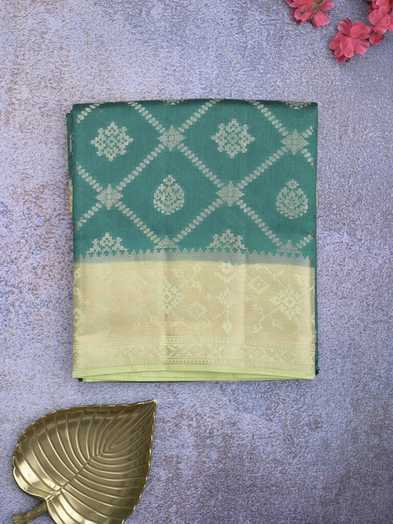Raw mango pattu saree peacock green color allover zari weaves & zari border with rich pallu and contrast plain blouse