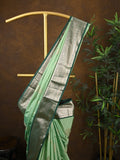 Kanchi pattu saree pista green color allover zari weaves & kanchi border with rich pallu and contrast plain blouse