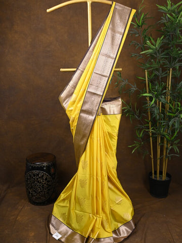 Kanchi pattu saree yellow color allover zari weaves & kanchi border with rich pallu and contrast plain blouse