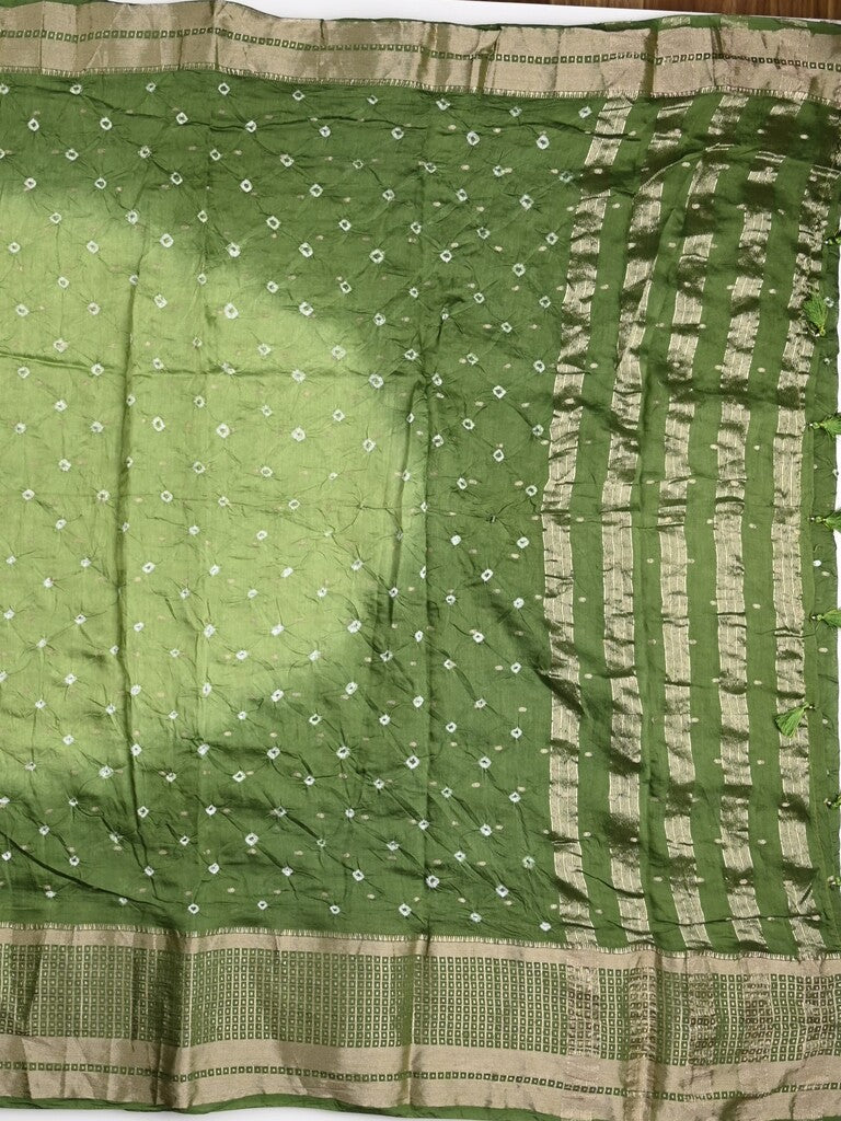 Munga bandhani fancy saree light green color allover work & zari border with contrast pallu and blouse