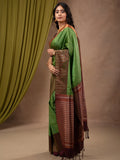 Kanchi pattu saree leaf green color allover zari weaves & zari border with contrast pallu and plain contrast blouse