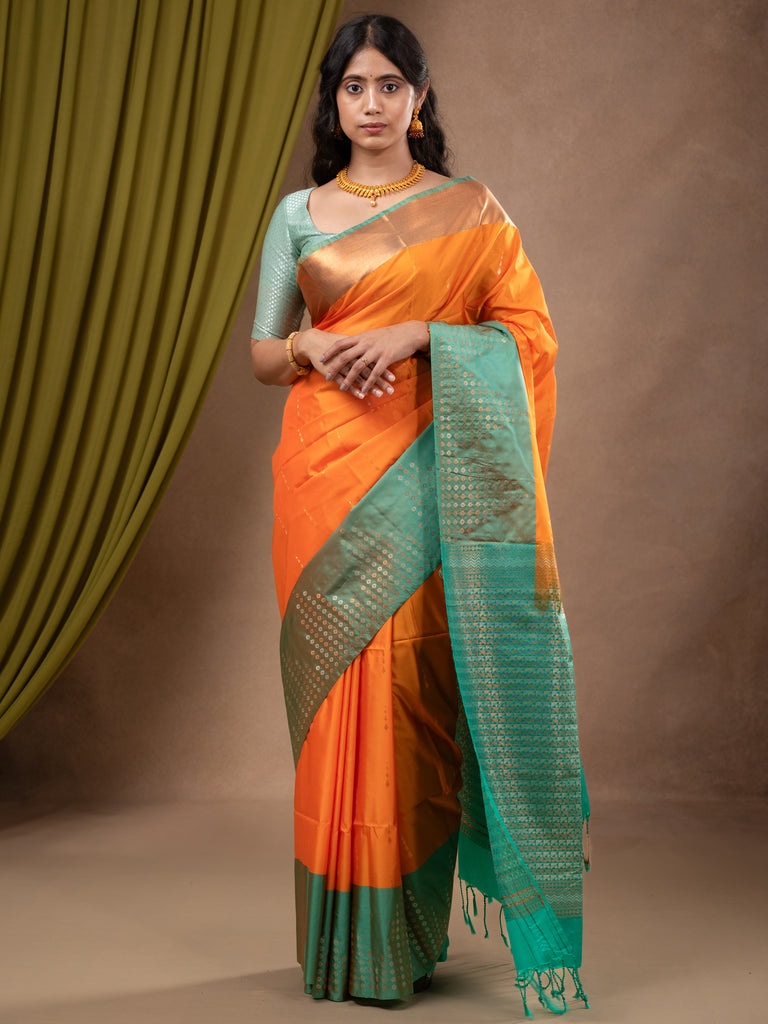 Kanchi pattu saree orange color allover zari weaves & zari border with contrast pallu and plain contrast blouse