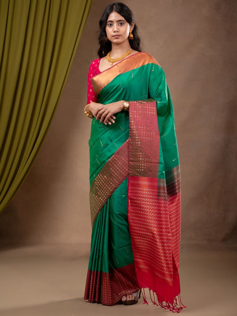 Kanchi pattu saree peacock green color allover zari weaves & zari border with contrast pallu and plain contrast blouse