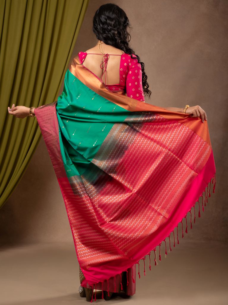 Kanchi pattu saree peacock green color allover zari weaves & zari border with contrast pallu and plain contrast blouse