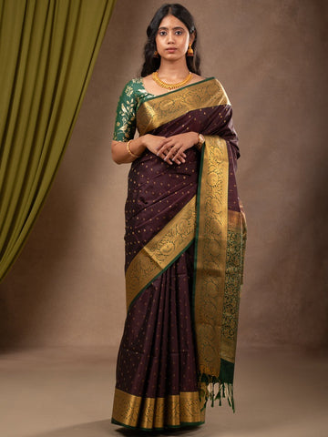 Kanchi pattu saree dark wine color allover zari motifs & zari border with rich pallu and contrast plain blouse