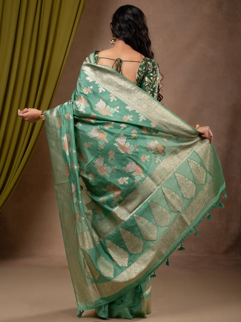 Dupion fancy saree lux green color allover weaves & zari border with zari pallu and plain self blouse
