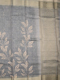 Jute tissue fancy saree grey color allover prints & zari border with short pallu and plain blouse