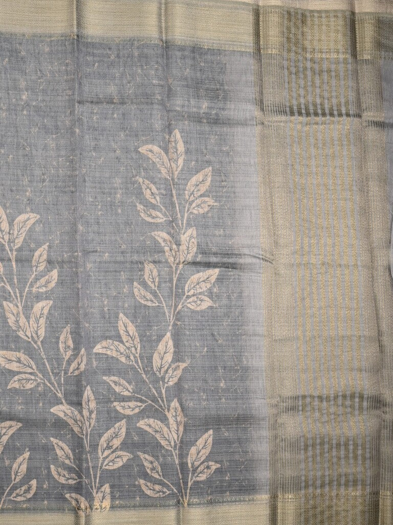 Jute tissue fancy saree grey color allover prints & zari border with short pallu and plain blouse