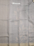 Jute tissue fancy saree grey color allover prints & zari border with short pallu and plain blouse