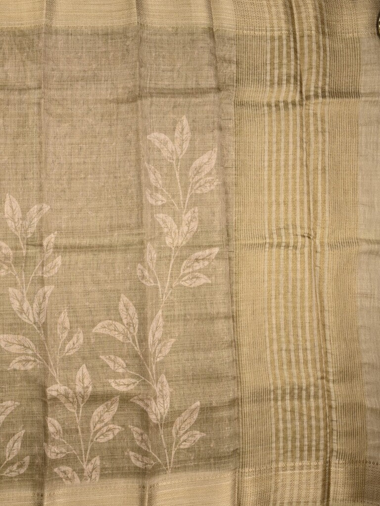 Jute tissue fancy saree olive green color allover prints & zari border with short pallu and plain blouse