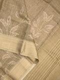 Jute tissue fancy saree olive green color allover prints & zari border with short pallu and plain blouse
