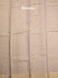 Jute tissue fancy saree light grey color allover prints & zari border with short pallu and plain blouse