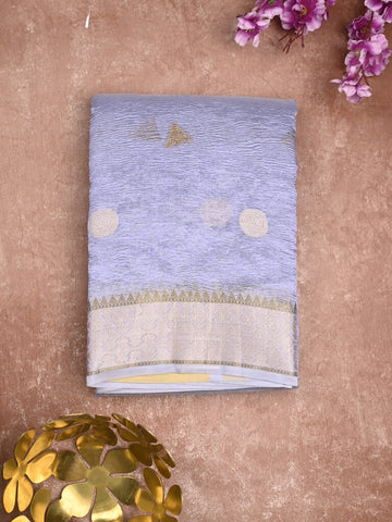 Tissue crush fancy saree light blue color allover motifs & zari border with short zari pallu and tissue blouse