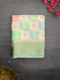 Georgette fancy saree multi color allover checks, motifs & zari border with short pallu and contrast blouse