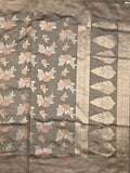 Dupion fancy saree grey color allover weaves & zari border with zari pallu and plain self blouse