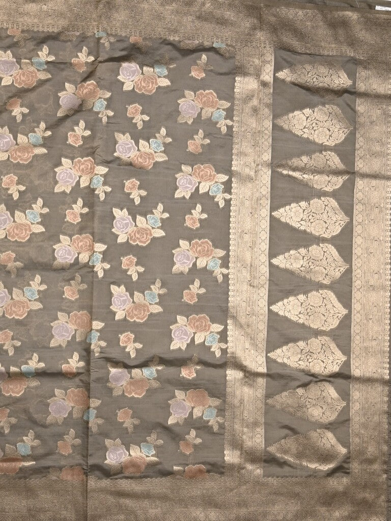 Dupion fancy saree grey color allover weaves & zari border with zari pallu and plain self blouse