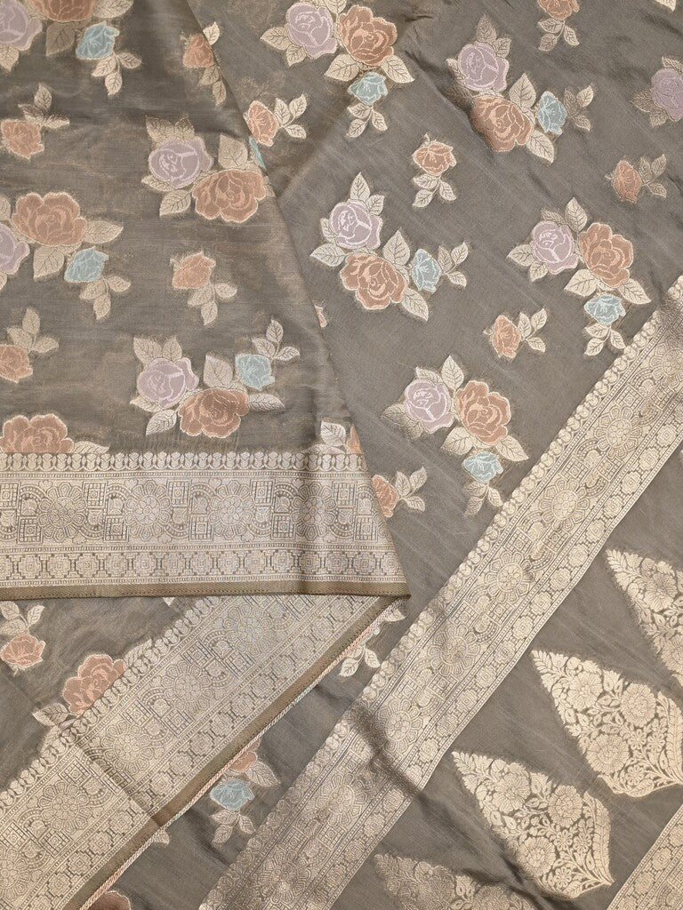 Dupion fancy saree grey color allover weaves & zari border with zari pallu and plain self blouse