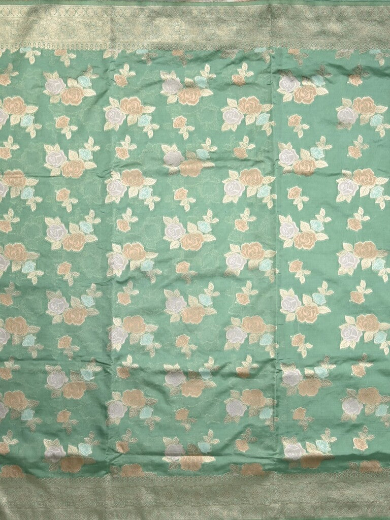 Dupion fancy saree lux green color allover weaves & zari border with zari pallu and plain self blouse