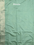 Dupion fancy saree lux green color allover weaves & zari border with zari pallu and plain self blouse