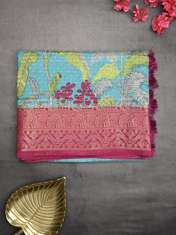 Dola silk fancy saree sky blue color allover prints & zari border with printed pallu and plain blouse