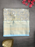 Kanchi tissue pattu saree grey color allover zari weaves & kanchi border with rich pallu and contrast tissue blouse