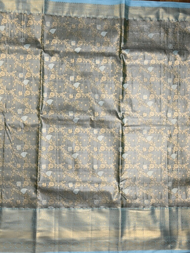Kanchi tissue pattu saree grey color allover zari weaves & kanchi border with rich pallu and contrast tissue blouse