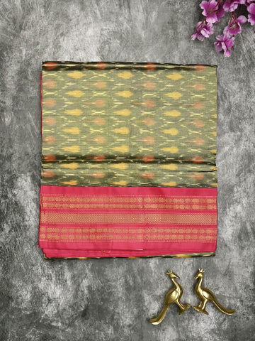 Ikkat pattu saree snuff color allover weaves & zari border with contrast pallu and contrast blouse