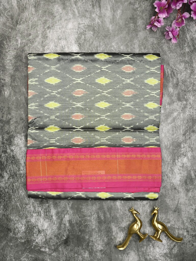 Ikkat pattu saree grey color allover weaves & zari border with contrast pallu and contrast blouse
