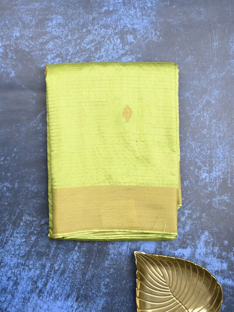 Dupion fancy saree lime green color allover zari motifs & zari border with zari pallu and plain blouse