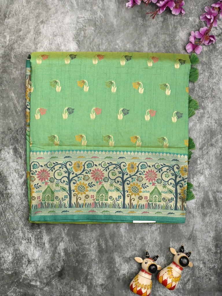 Dupion fancy saree light green color allover zari motifs & zari border with rich pallu and attached self blouse
