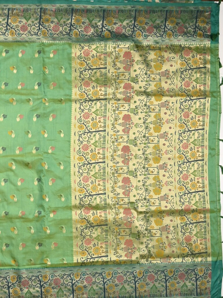 Dupion fancy saree light green color allover zari motifs & zari border with rich pallu and attached self blouse
