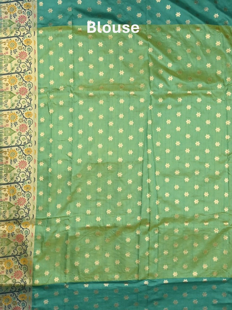 Dupion fancy saree light green color allover zari motifs & zari border with rich pallu and attached self blouse