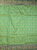 Dupion fancy saree light green color allover zari motifs & zari border with rich pallu and attached self blouse