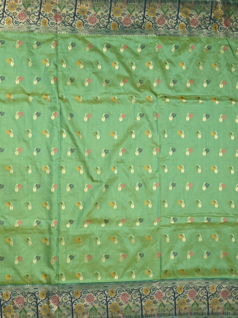 Dupion fancy saree light green color allover zari motifs & zari border with rich pallu and attached self blouse