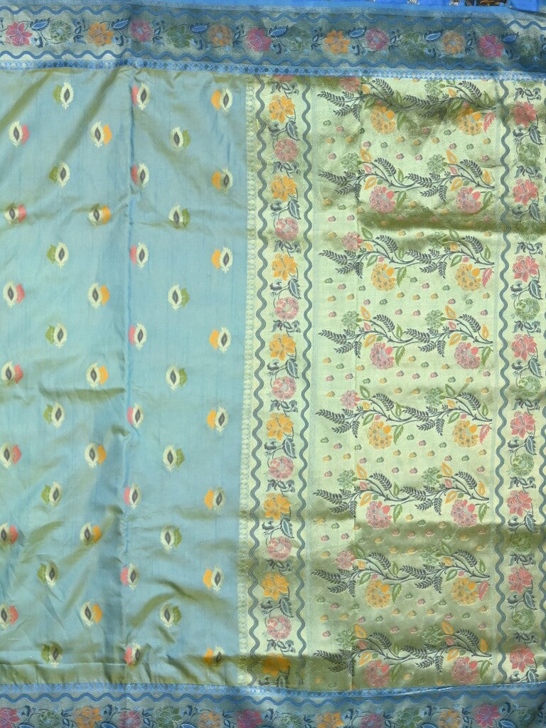 Dupion fancy saree light blue color allover zari motifs & zari border with rich pallu and attached self blouse