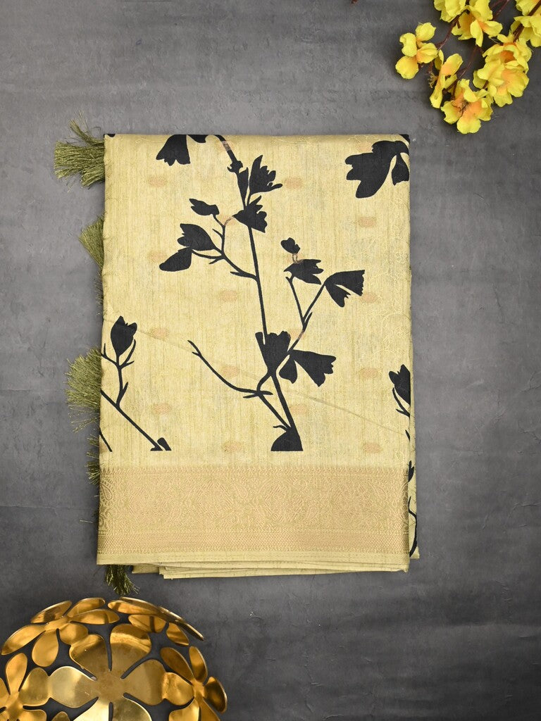 Dola silk fancy saree pastel yellow color allover prints & zari border with printed pallu and printed blouse