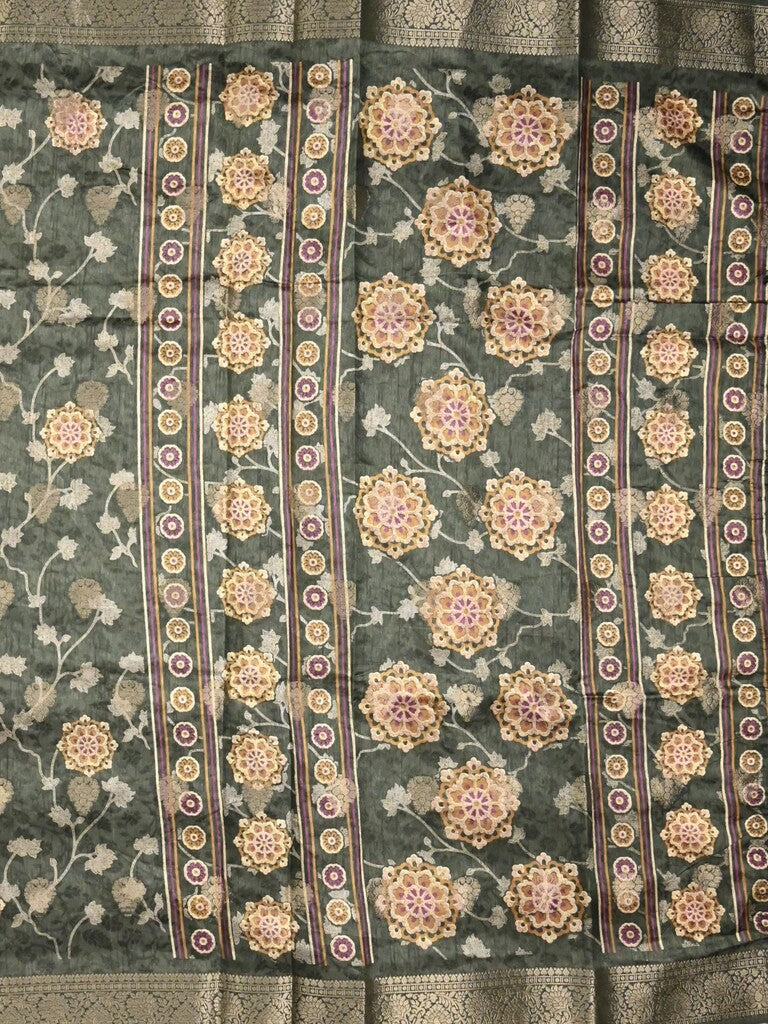 Dola silk fancy saree dark green color allover prints & zari border with printed pallu and printed blouse