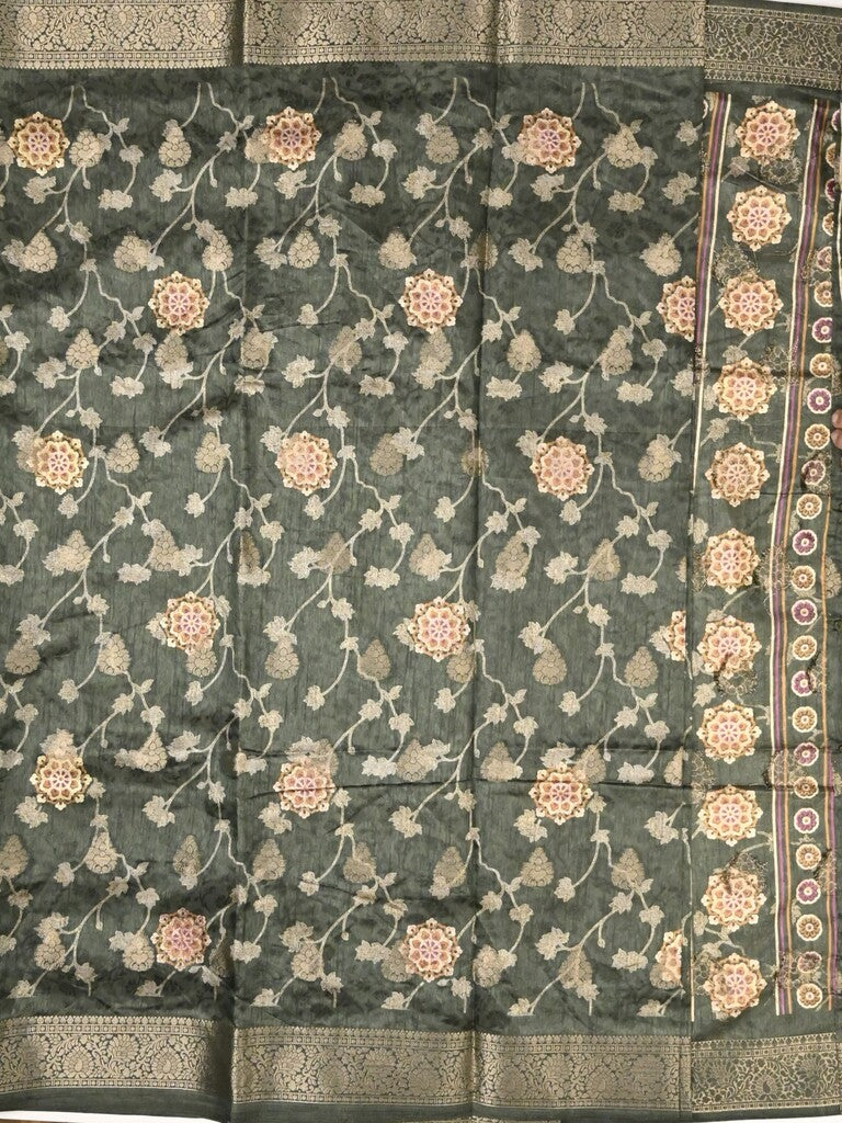 Dola silk fancy saree dark green color allover prints & zari border with printed pallu and printed blouse