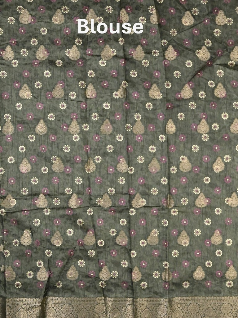 Dola silk fancy saree dark green color allover prints & zari border with printed pallu and printed blouse