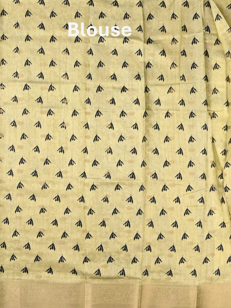 Dola silk fancy saree pastel yellow color allover prints & zari border with printed pallu and printed blouse