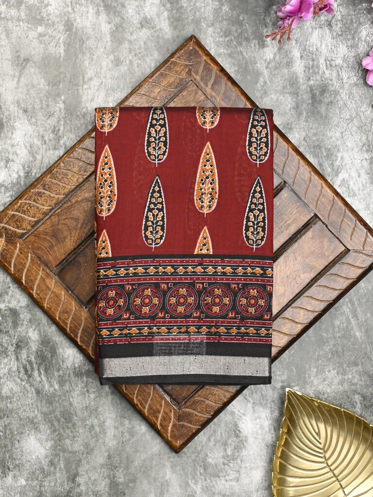 Maheshwari fancy saree maroon color allover prints & printed zari border with printed pallu and contrast blouse