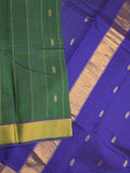 Uppada seiko pattu saree bottle green color allover checks, motifs & zari border with contrast pallu and plain blouse