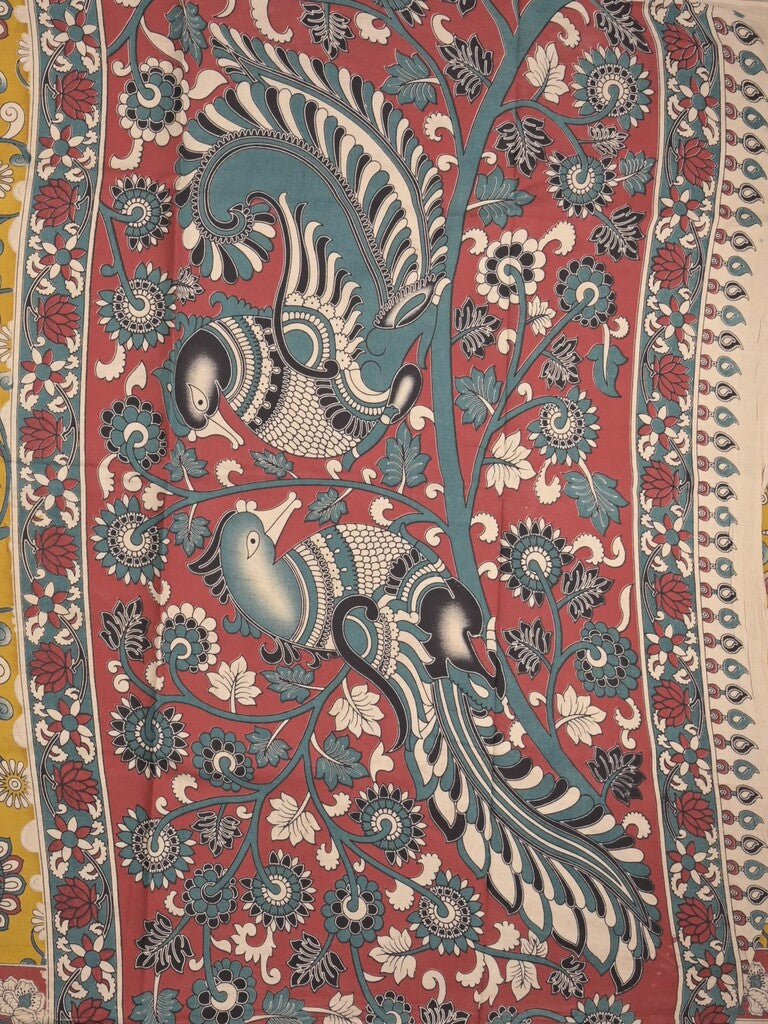 Kalamakari cotton saree golden yellow color allover prints & printed border with printed pallu and contrast blouse